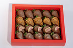 Zaynab Box – milk chocolate strawberries with fig, wafer flakes, stripes, and gold dust, textured Dubai gift box